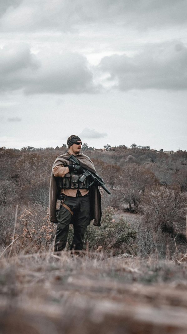 A Man Holding a Rifle